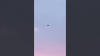 Aeroplanes take off and disappear in colourful sky. Aeroplanes take off. Colourful sky.