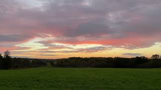 Sunset Over Hay Field