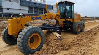 Great work Techniques operator motor grader plowing soil and CATERPILLAR excavator working clean