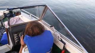 8 year old driving a boat