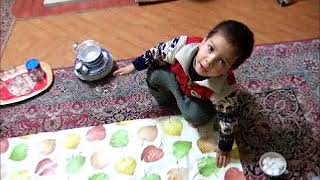 Morteza, little boy with his chores in Van, Turkey