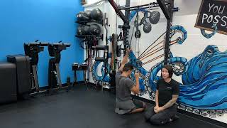 Low Kneeling Single Arm Alternating Banded Pulldown