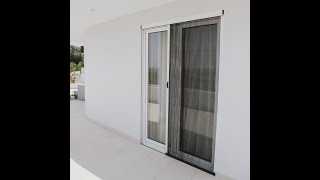 Barrier free pleated screen door