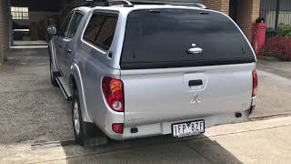 2015 Mitsubishi Triton MN in Silver with UniUte canopy.