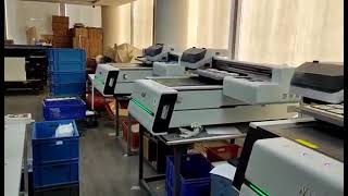 Several Nocai a1 size uv printers NC-UV0609PEIII do the printing job at the same time