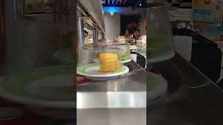 Conveyor belt food restaurant Vietnam.