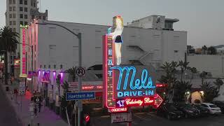 Neon Nights at Mel's Diner: Iconic Hollywood Eatery | Stunning Drone Footage | B-roll exterior (4k)