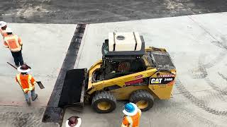 Laying down an asphalt curb and speed bump, 9/29/2023