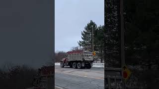 1980 Mack hauling snow.