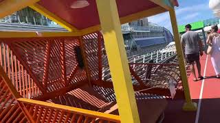 Royal Caribbean Independence of the Seas pools while next to Icon of the Seas