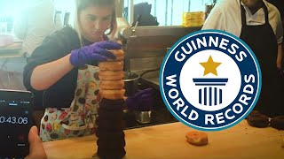 Tallest stack of DOUGHNUTS in one minute! | Guinness World Records