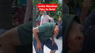 Lucu 🤪 lomba Bapak Bapak Masukkan Paku Ke Botol #shorts #17agustus #lombaagustus