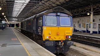 DRS Class 66 accelerates through Huddersfield Station