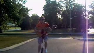 OneDream- Riding Unicycle while playing guitar - Test Run 2