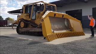 RediPlant | Attaching an 18 Foot Fold Up Stick Rake to a Caterpillar D6T Dozer