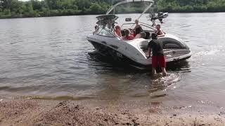 people pick up with a 212X jetboat