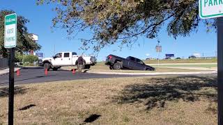 Ford pulls a Chevy out of a ditch