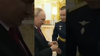 putin get a gift by a military officer