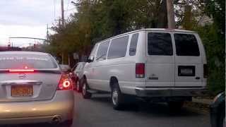 Long line of cars waiting to fill up gas, after wake of Hurricane Sandy, 2012