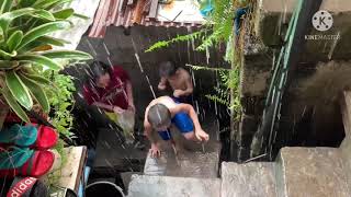 Kids live a simple life shower under the rain