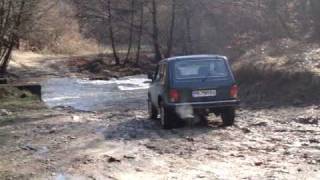 Lada Niva in a river