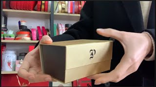 Trapezoidal folding box