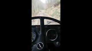 Truck driving FAP 2235 in the forest