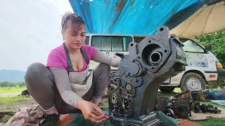 Genius girl who repairs and restores agricultural machinery.