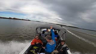 Boating on the Mackenzie river with North Star Adventures - Passing one of many barges we saw