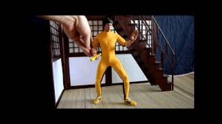 1/6 Bruce Lee (Game of Death) with battery powered Nunchaku