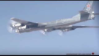 Russian long range bombers launching cruise missiles on ISIS (Raw)