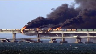 Ukraine Military explosion on Kerch Strait Bridge Russia to Crimean Peninsula Putin 70th B Day Gift