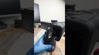 Remove battery door on Sony a7IV