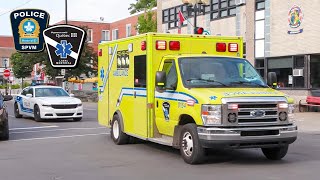 Montréal | Cyclist Nearly Gets Taken Out by Police Car Escorting Responding Urgences-Santé Ambulance