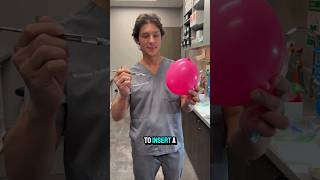 Insert a needle into a balloon without popping it #shorts #shortvideo