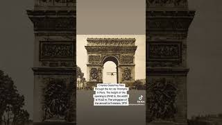 Charles Godefroy flies through the Arc de Triomphe in Paris. #history