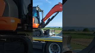 Digger on the truck #digger #truck #excavator #kubota