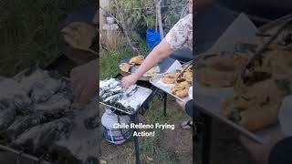 Frying Chile Relleno's. Visit us at ChucksCowboyWoks.com