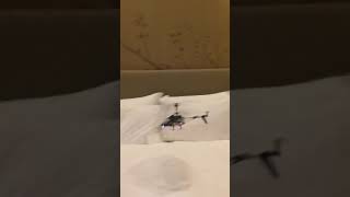 Flying Radio Control RC helicopter around in my hotel room