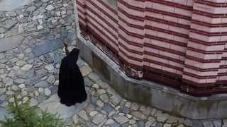 Rila Monastery - Beating the portable wooden Semantron  ...