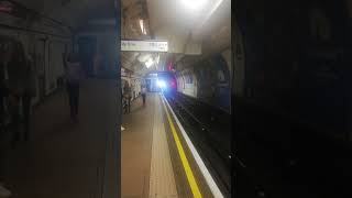 Tube Train arriving at Green Park Station