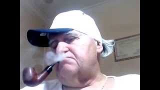 Smoking my Jeantet Curved, Pipe Tobaccos, with White Dark Blue Hat; White T-Shirt.