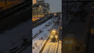 NJT arrow 3 passing by hunters point on a snowy day