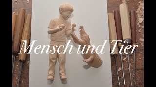 Junge und Krokodil aus Holz schnitzen