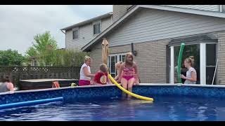 Kids get into the pool for the first time