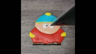 watch a Fun Eric Cartman Southpark sugar cookie how to video using royal icing #howto #cookiedesign