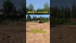 Wheel 75 excavator is running.