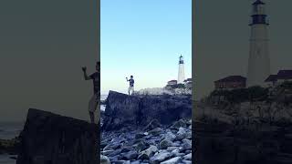 Juggling Rocks by a Maine Lighthouse