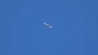 KC-10 & 777-300ER flying by my neighborhood