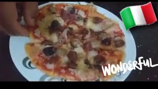 البيتزا الايطاليه بطريقة اشهر محلات ايطاليا #pizza_italia #pizza_hut